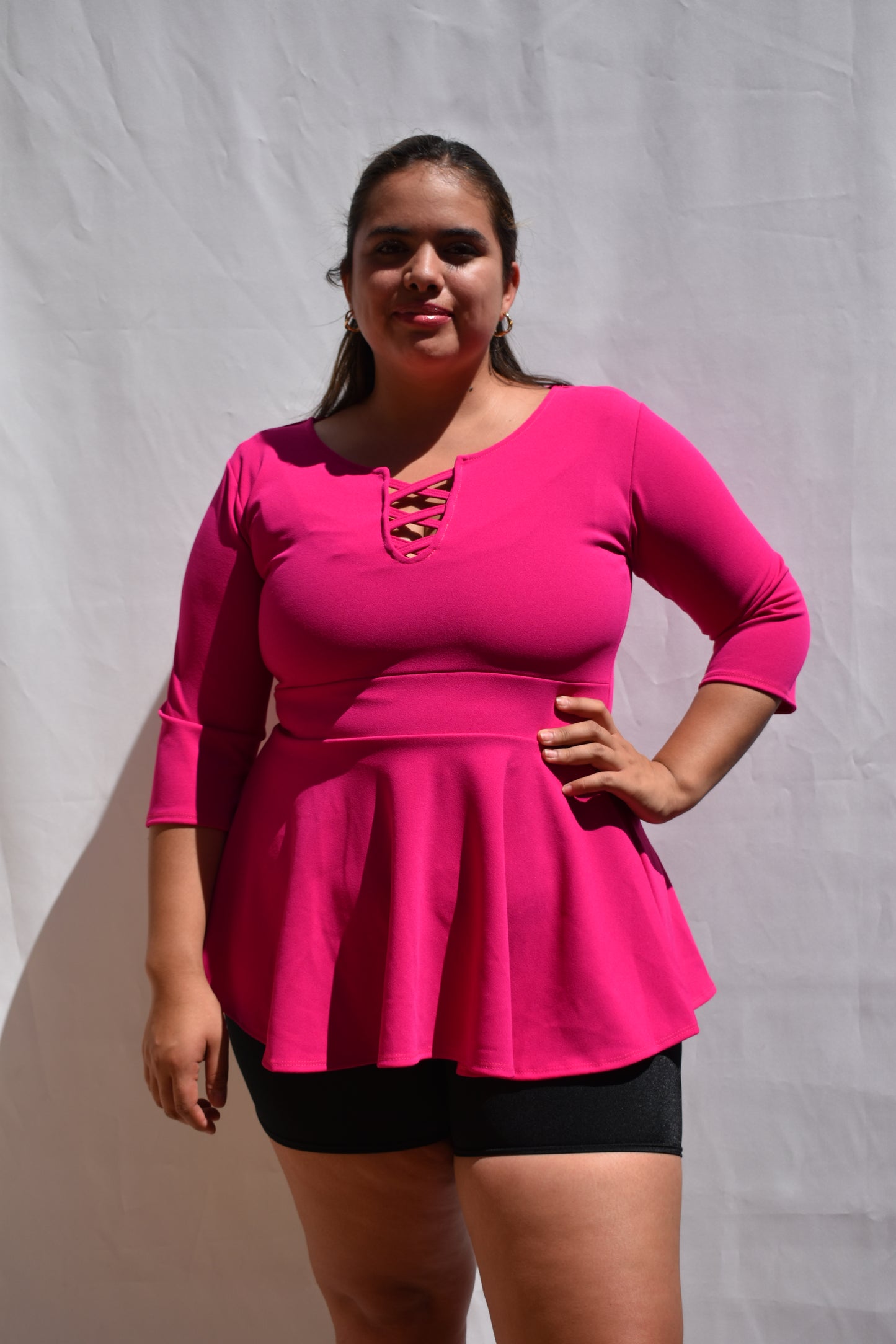 POLERA PEPLUM FUCSIA