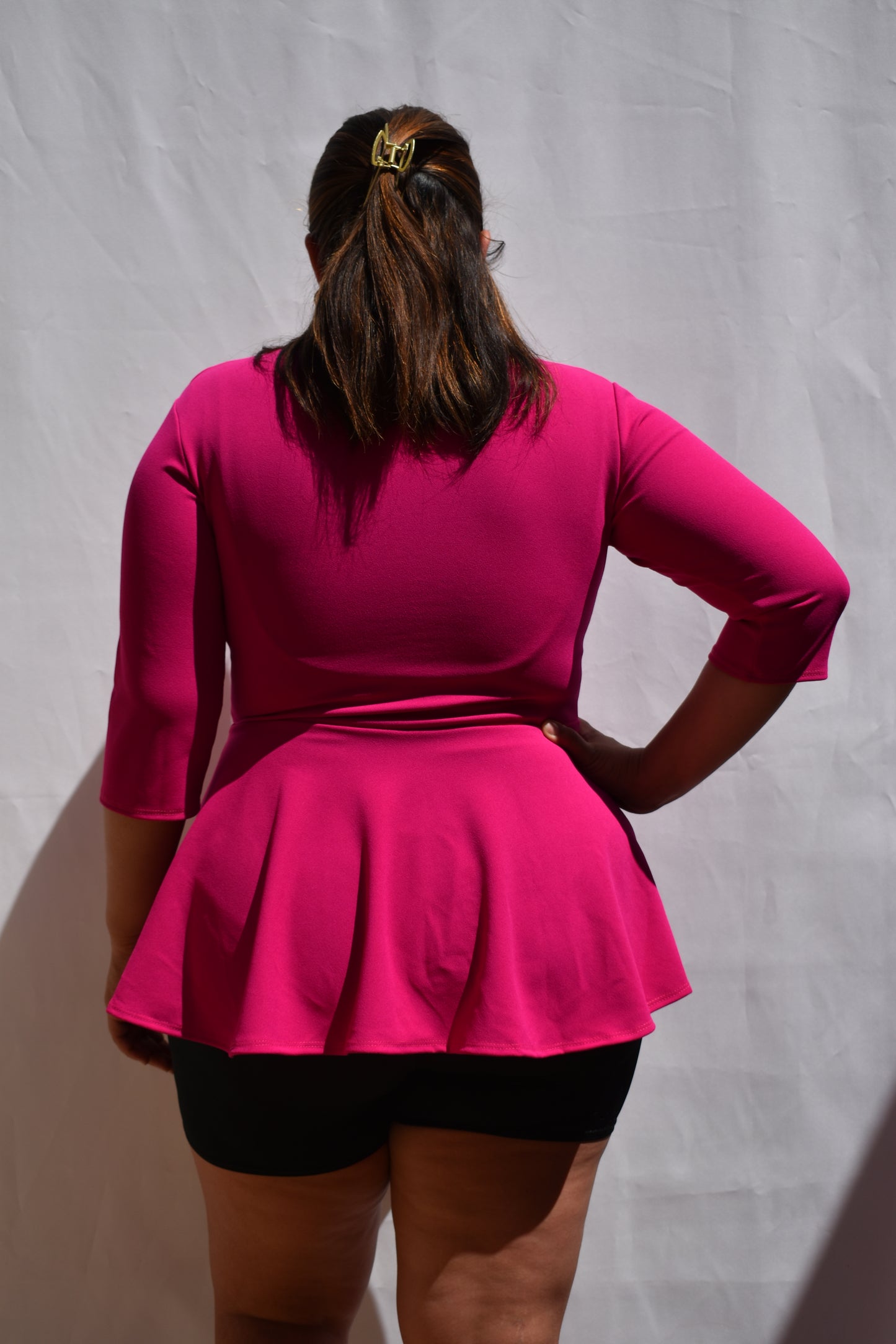 POLERA PEPLUM FUCSIA